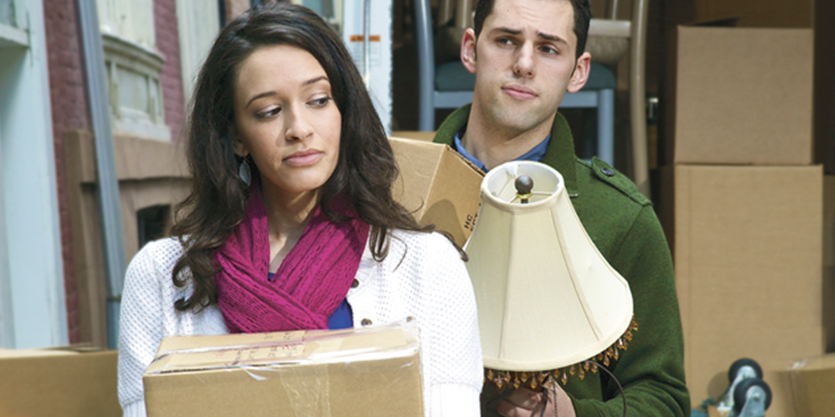 A man and woman moving in together