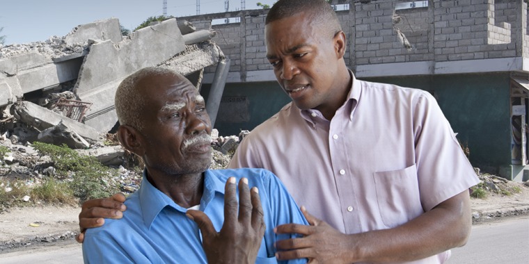 A man helping someone who is suffering