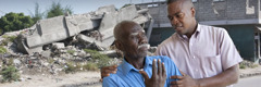 A man helping someone who is suffering