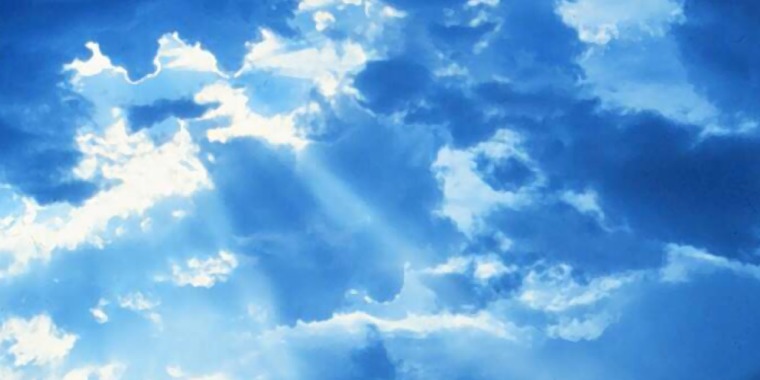 The sun’s rays shining through the clouds