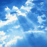 The sun’s rays shining through the clouds