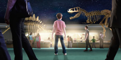 Diákok dinoszaurusz csontvázakat néznek a múzeumban