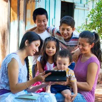 A family watching a video in their native language