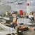 Treballadors voluntaris de construcció preparen el nou centre del Departament de Formació Tècnica