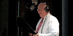 Mark Sanderson of the Governing Body reads in a recording studio