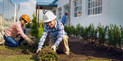Jehovah’s Witnesses do landscaping outside a newly constructed Kingdom Hall