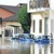 A flooded street near Moncalieri, Italy, with cars partially submerged