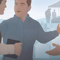 A man in a cemetery speaks to a Witness and gestures to a graveside service in the background.