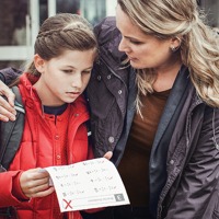 A mother comforts her daughter who received a poor grade on a school paper