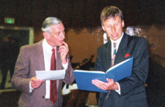 Miles Northover and David Merry reviewing notes at an assembly.