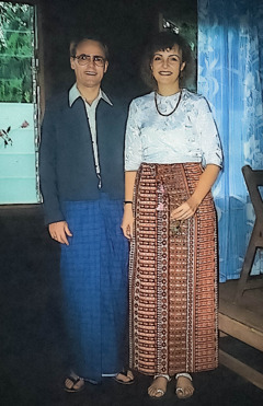 Håkan and Helene wearing traditional dress from Myanmar.