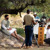 A film crew preparing to shoot an outdoor scene for an episode of “The Good News According to Jesus.” The brother who portrays Jesus sits under a tree.